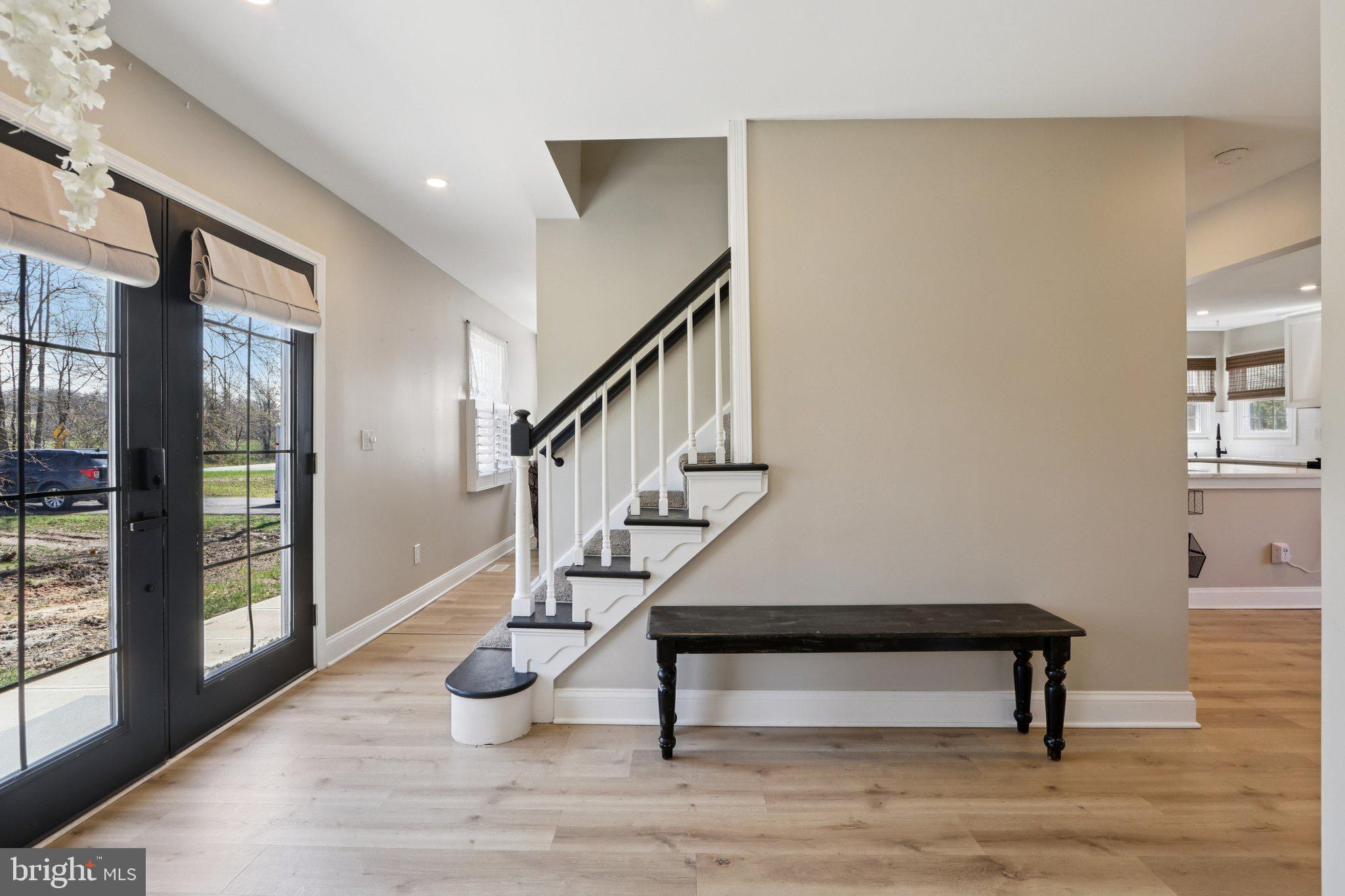 351 Merrick Road Robbinsville, NJ 08691 - Photo 11 of 69 a view of entryway livingroom and hall with wooden floor