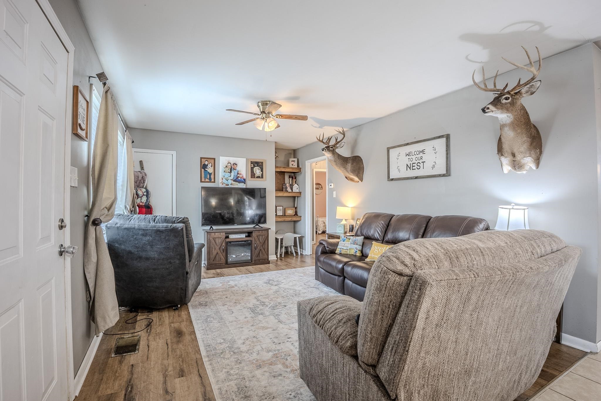 6620 Conner Whitefield Road Ripley, TN 38063 - Photo 7 of 13 a living room with furniture and a flat screen tv