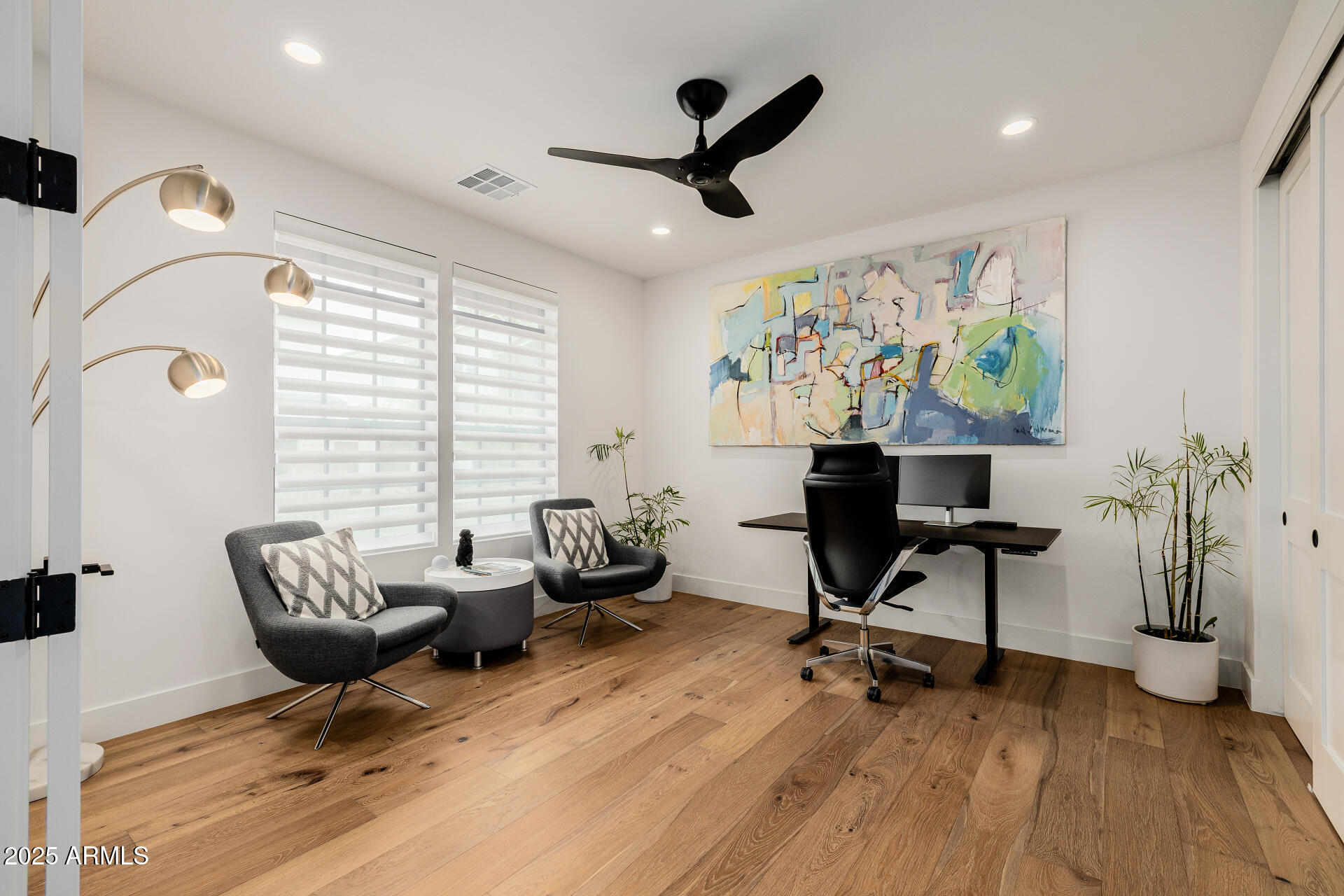 7245 North 13th Lane Phoenix, AZ 85021 - Photo 23 of 40 a living room with furniture or window and a wooden floor