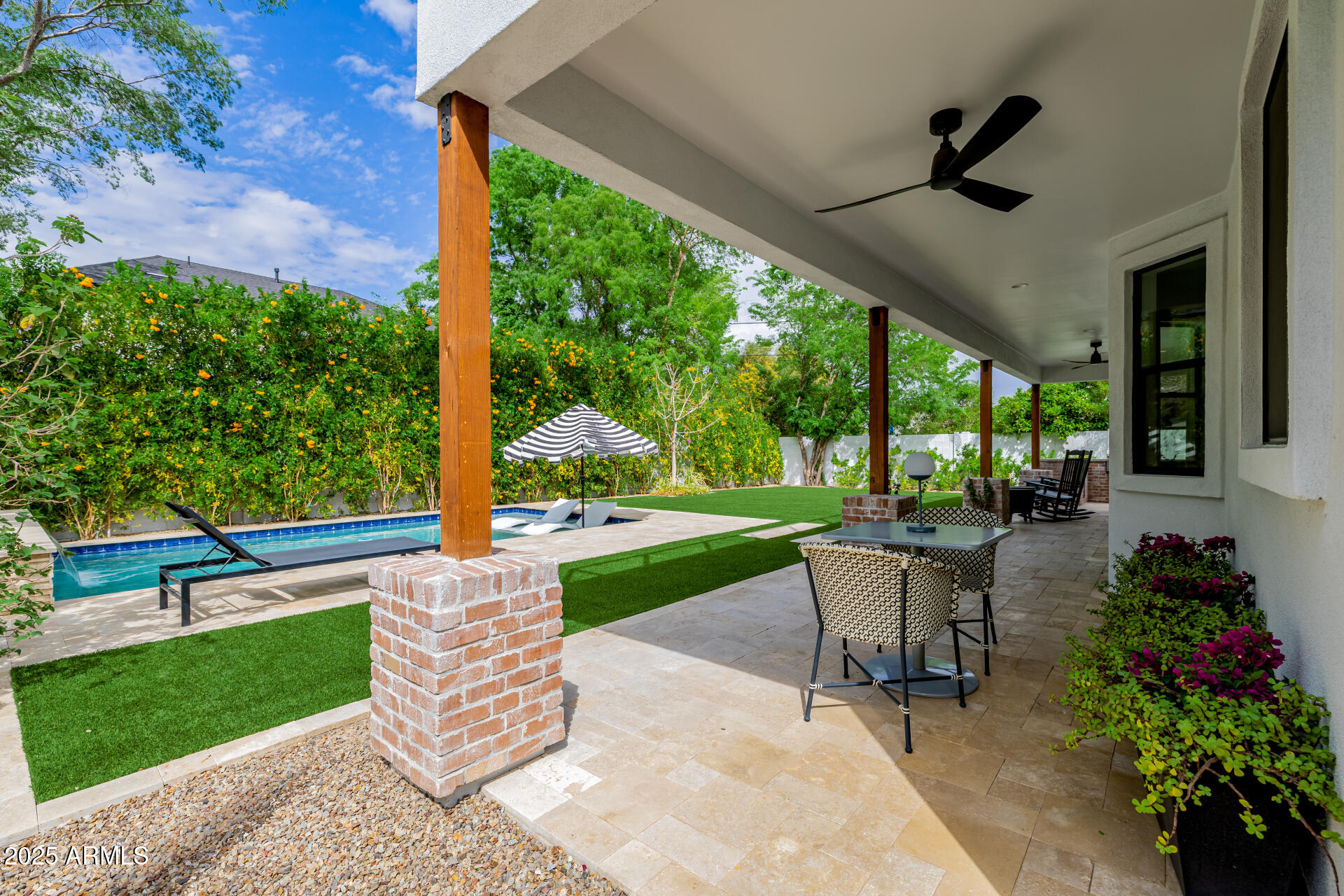7245 North 13th Lane Phoenix, AZ 85021 - Photo 28 of 40 a view of a porch with furniture and garden