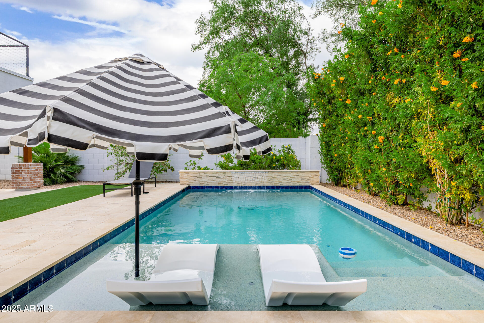 7245 North 13th Lane Phoenix, AZ 85021 - Photo 30 of 40 a view of a pool with chairs