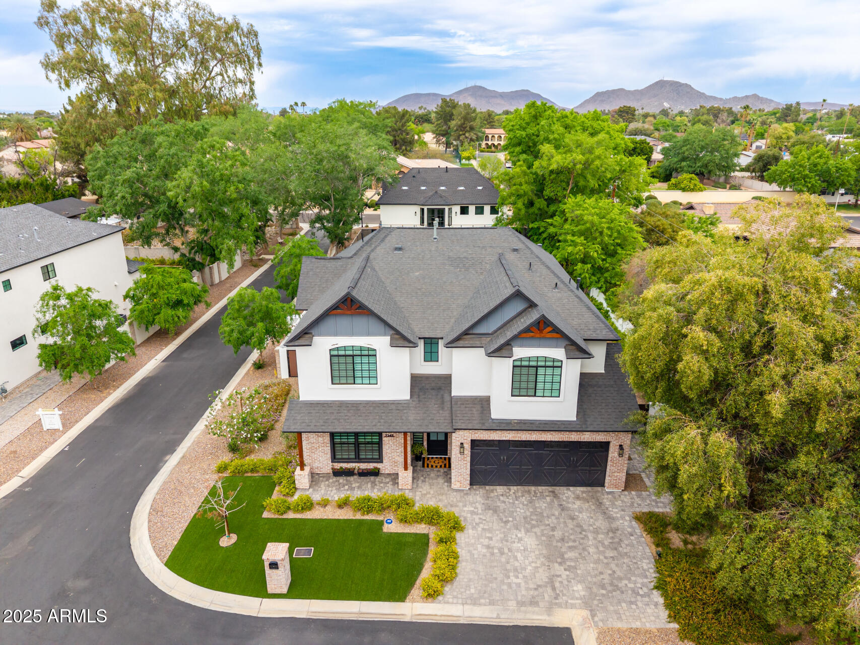 7245 North 13th Lane Phoenix, AZ 85021 - Photo 32 of 40 a aerial view of a house with swimming pool and mountains