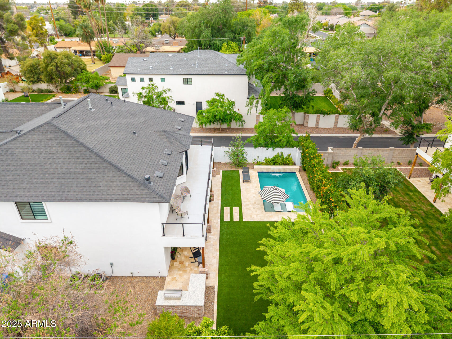 7245 North 13th Lane Phoenix, AZ 85021 - Photo 34 of 40 an aerial view of house with yard swimming pool and outdoor seating