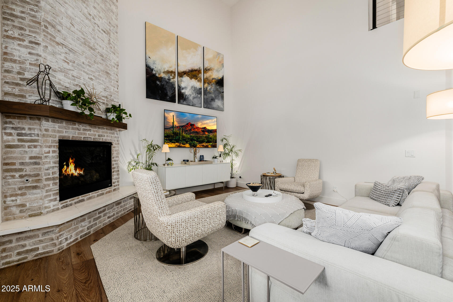 7245 North 13th Lane Phoenix, AZ 85021 - Photo 4 of 40 a living room with furniture and a fireplace