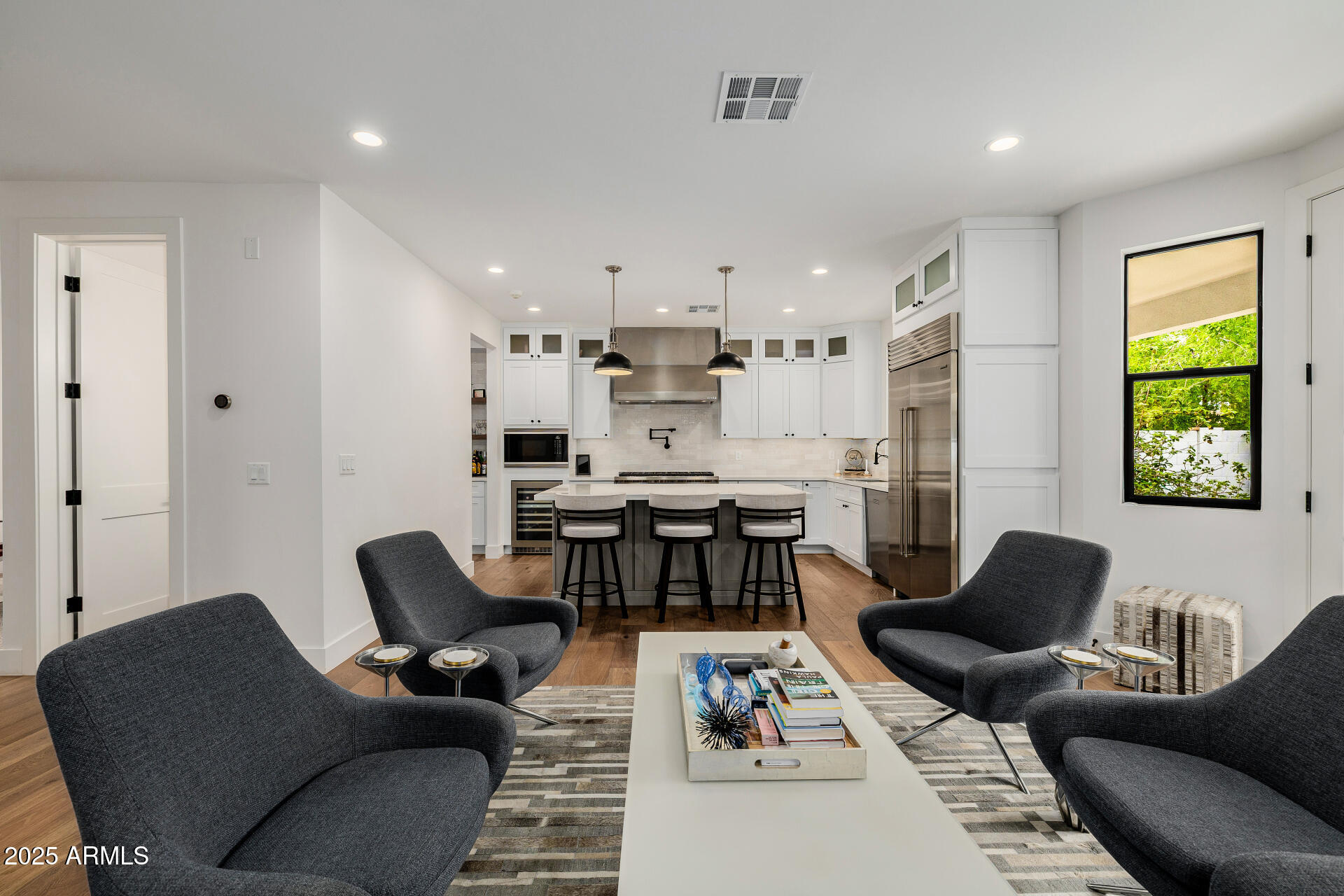 7245 North 13th Lane Phoenix, AZ 85021 - Photo 7 of 40 a living room with furniture and a large window