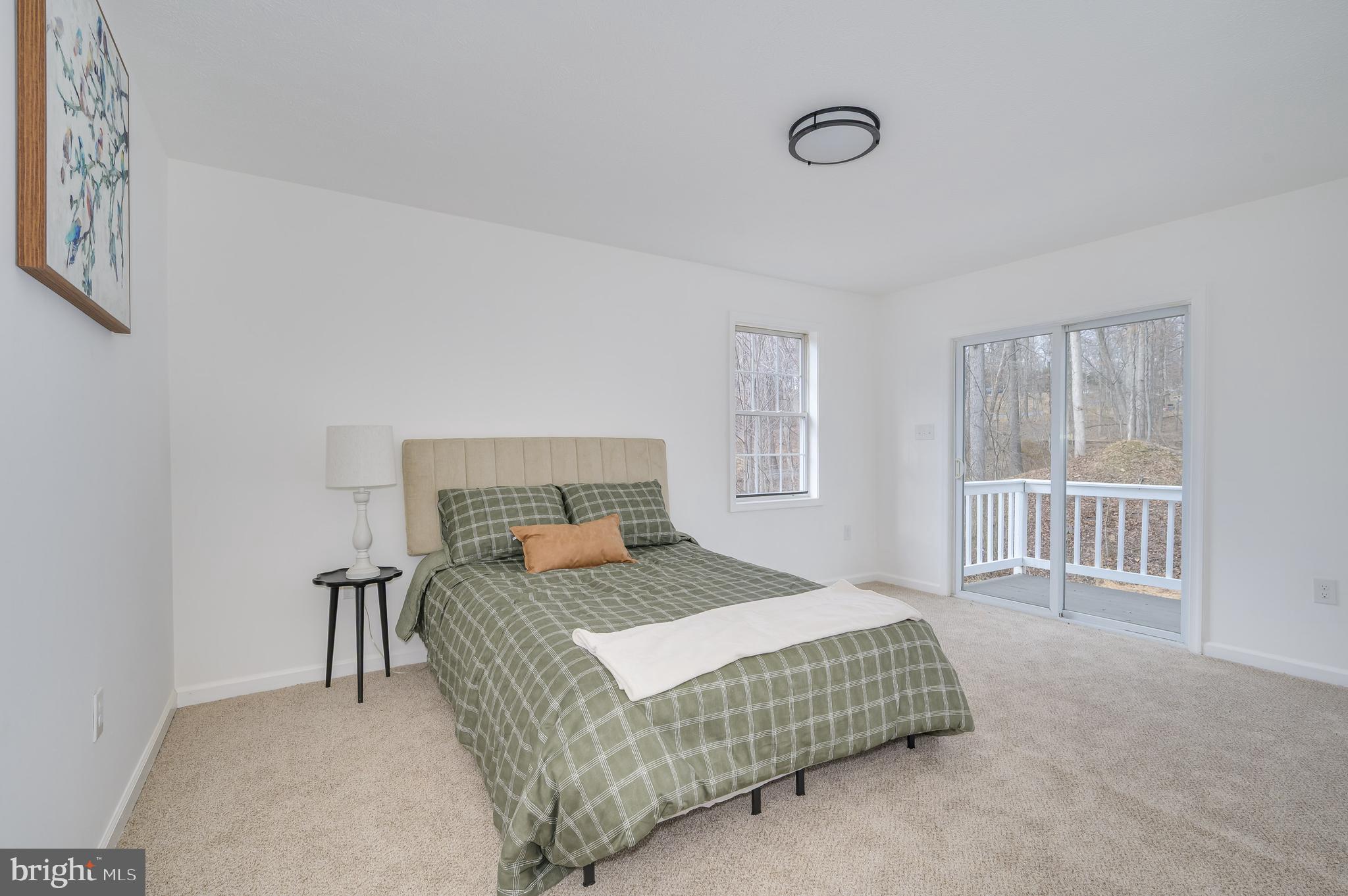 131 Flop Ear Road Harpers Ferry, WV 25425 - Photo 2 of 24 a bedroom with a bed and a window