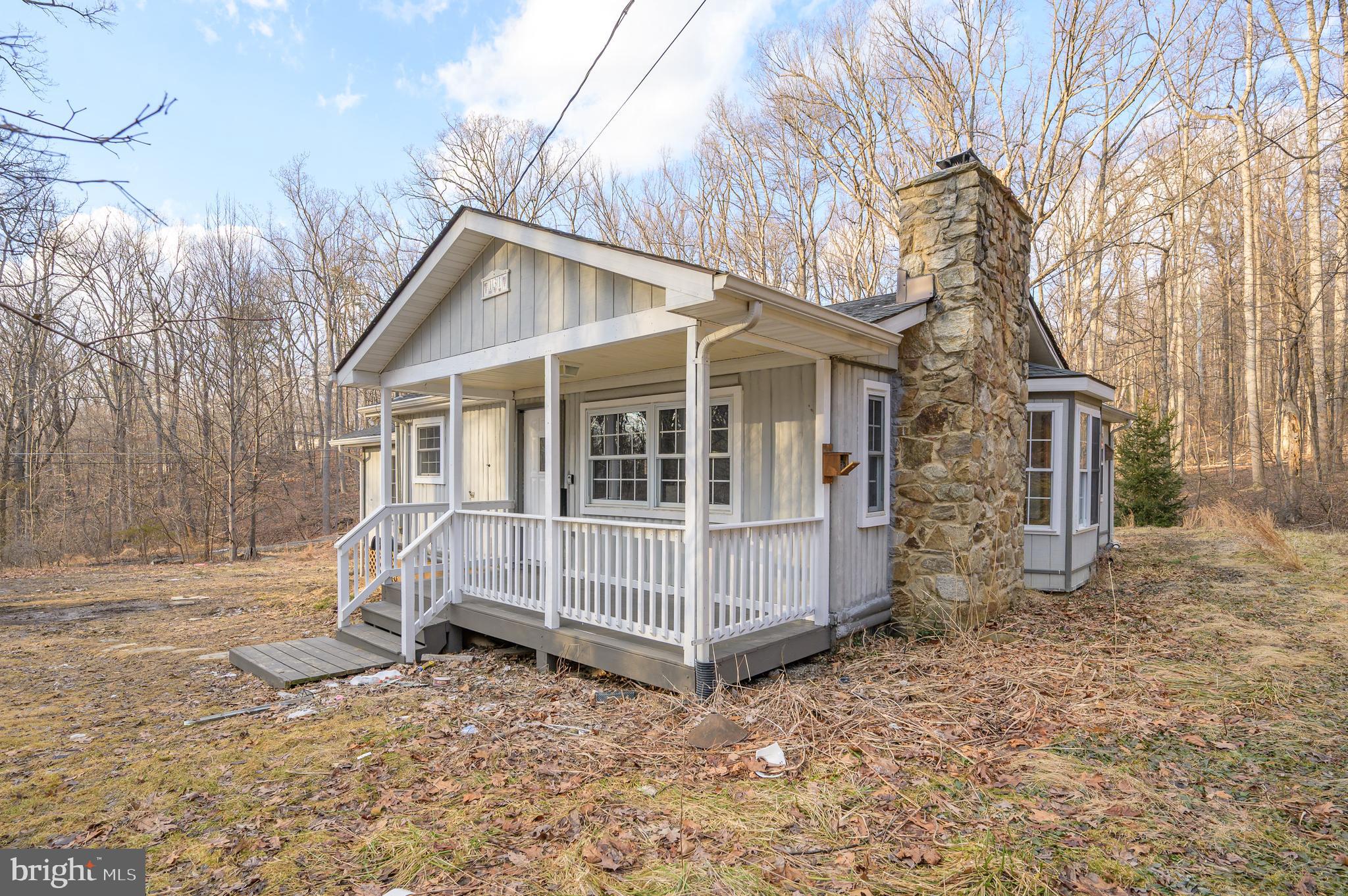 131 Flop Ear Road Harpers Ferry, WV 25425 - Photo 24 of 24 a view of a house with a yard