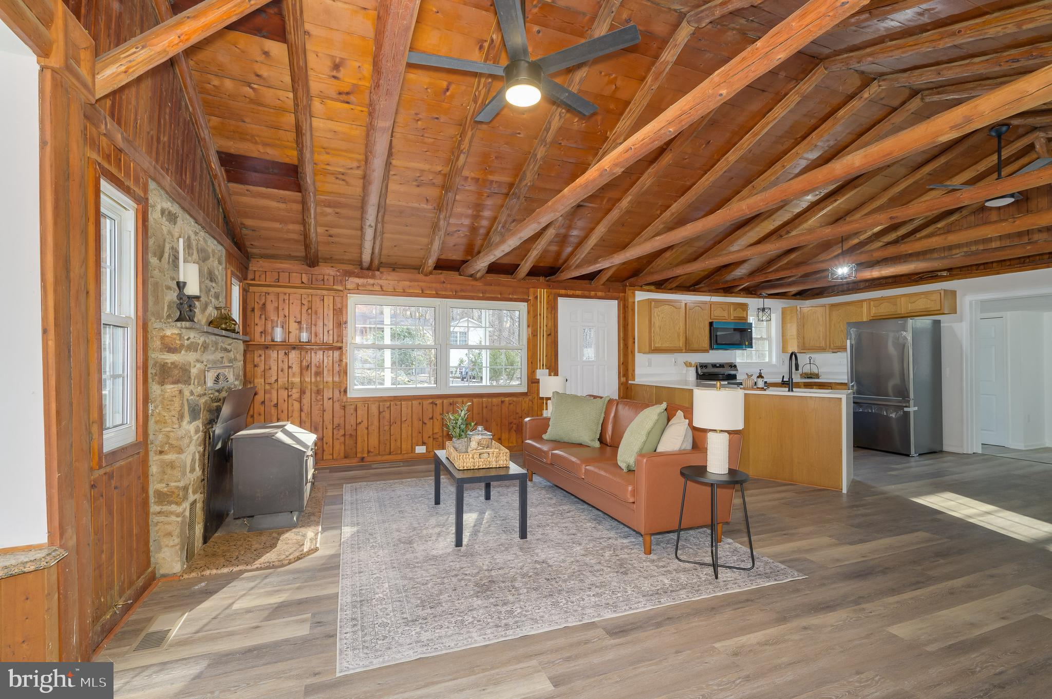 131 Flop Ear Road Harpers Ferry, WV 25425 - Photo 7 of 24 a living room with furniture a rug and outdoor space