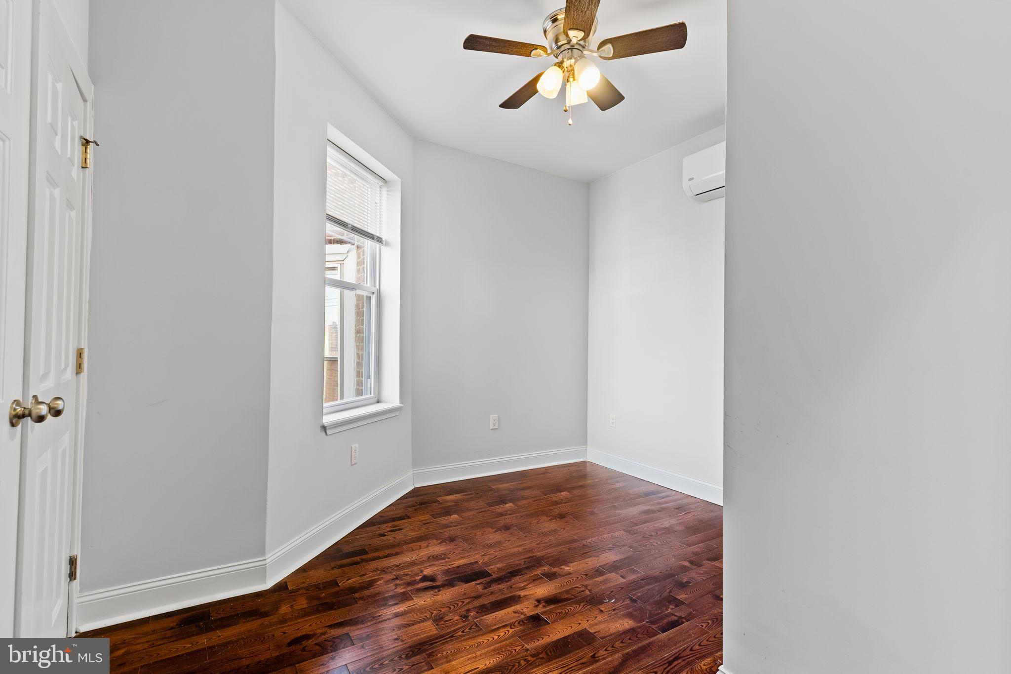 4633 Walnut Street, Unit D Philadelphia, PA 19139 - Photo 10 of 10 a view of a room with wooden floor and closet