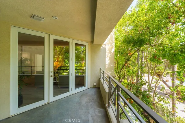 a view of balcony and yard