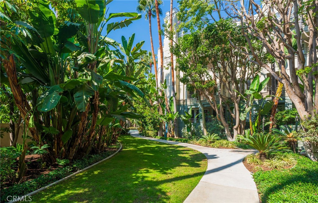 2233 Martin, Unit 202 Irvine, CA 92612 - Photo 2 of 33 a green field with lots of trees in it