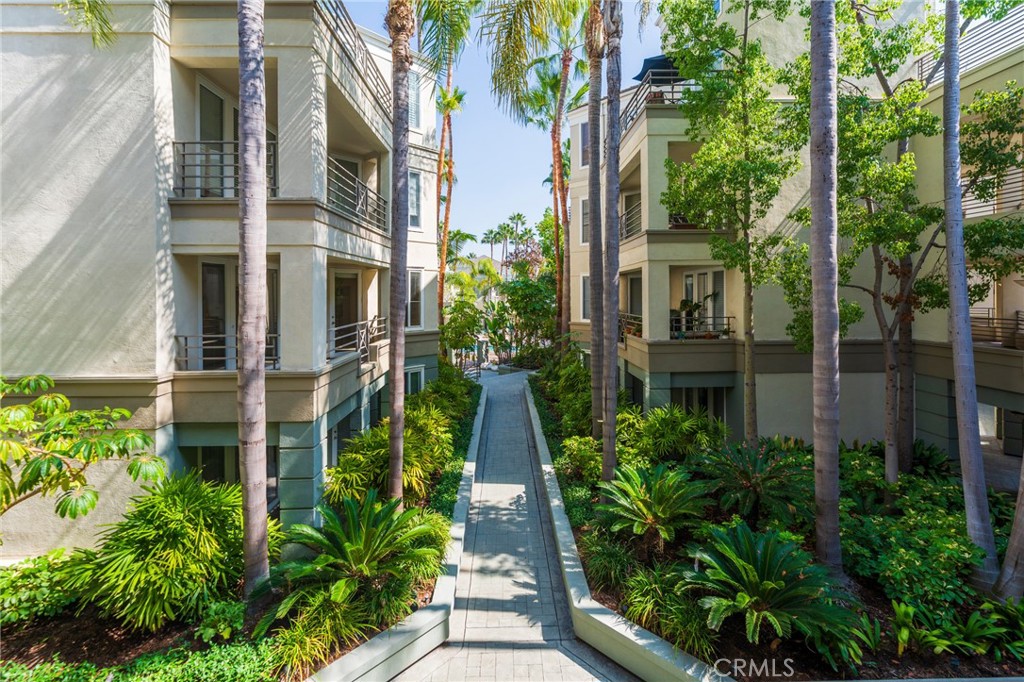 2233 Martin, Unit 202 Irvine, CA 92612 - Photo 24 of 33 a view of a pathway both side of the house