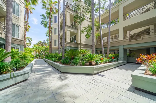 a view of swimming pool with a table and chairs