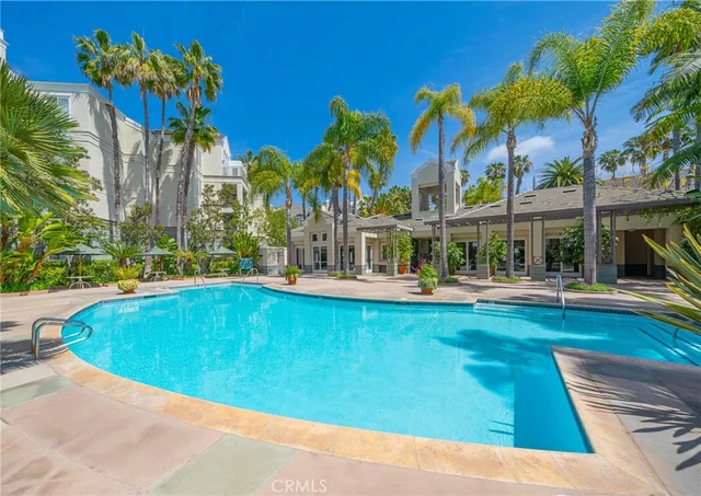 a view of swimming pool with chairs
