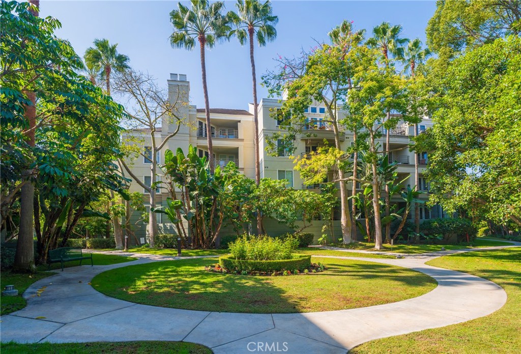 2233 Martin, Unit 202 Irvine, CA 92612 - Photo 3 of 33 a view of swimming pool with palm trees