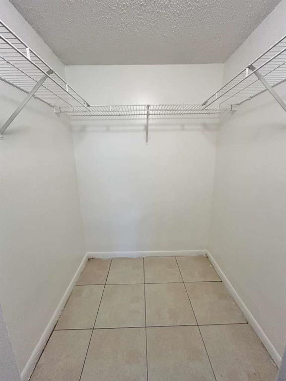 6900 Southwest 39th Street, Unit 305J Davie, FL 33314 - Photo 13 of 20 a view of a room with racks on the wall