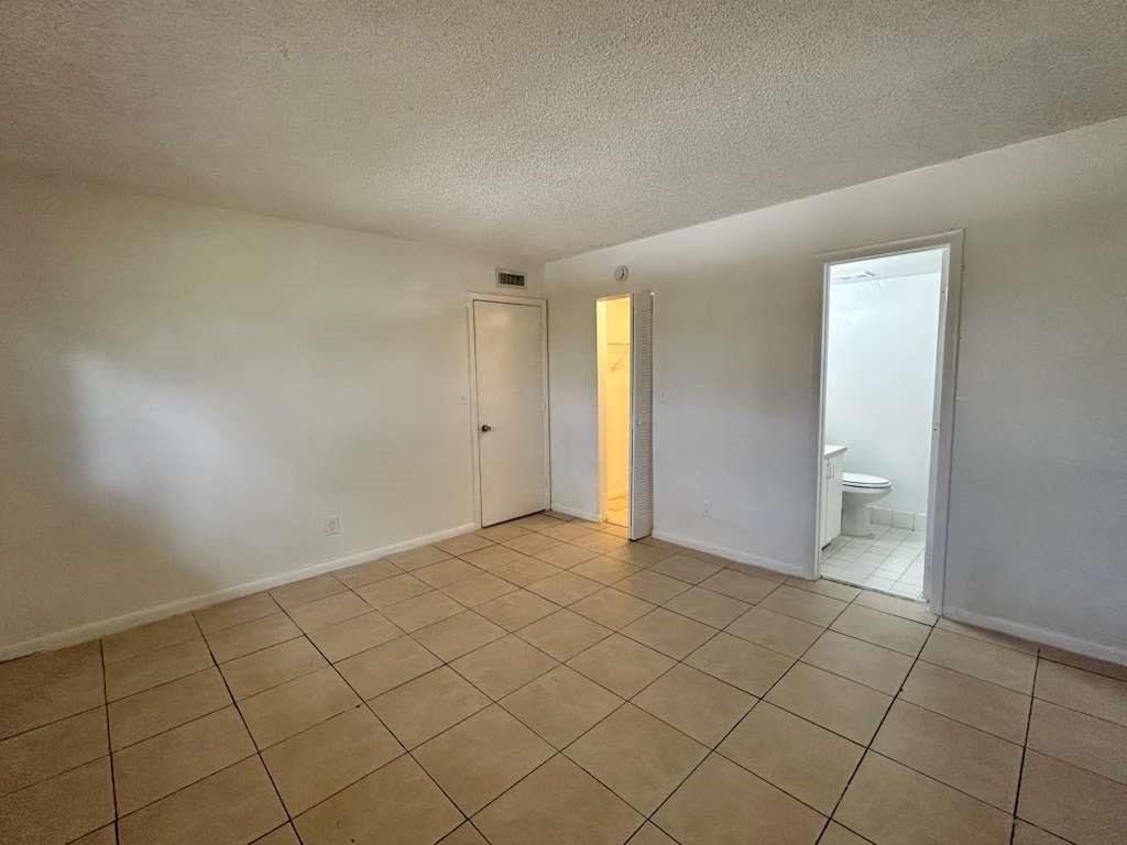 6900 Southwest 39th Street, Unit 305J Davie, FL 33314 - Photo 14 of 20 a view of an empty room and window