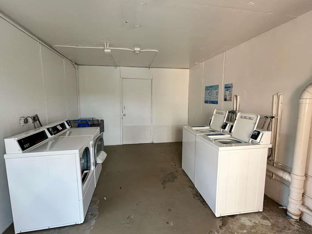 6900 Southwest 39th Street, Unit 305J Davie, FL 33314 - Photo 20 of 20 a utility room with dryer and washer