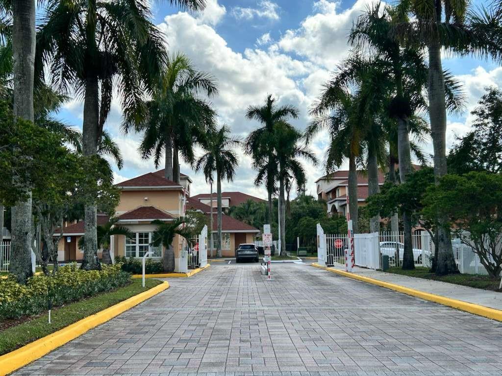 6900 Southwest 39th Street, Unit 305J Davie, FL 33314 - Photo 2 of 20 a view of a park with palm trees
