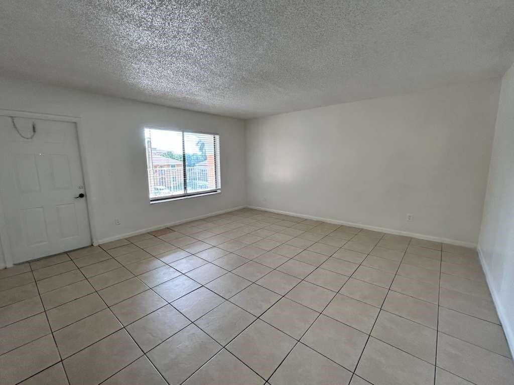 6900 Southwest 39th Street, Unit 305J Davie, FL 33314 - Photo 6 of 20 an empty room with windows