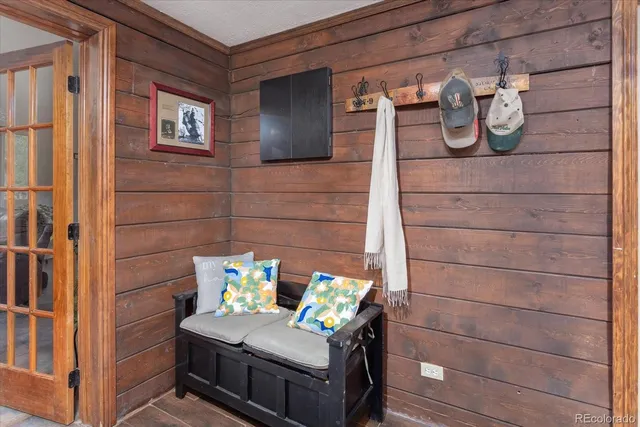 a bathroom with a sink and a potted plant