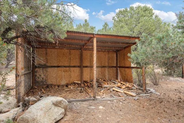 a room with water heater and painted walls