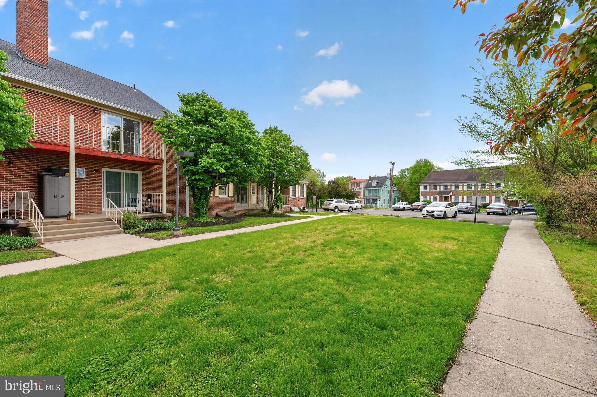 46 Buttonwood Street Mount Holly, NJ 08060 - Photo 3 of 26 Courtyard and Parking Lot at corner of Brainerd St