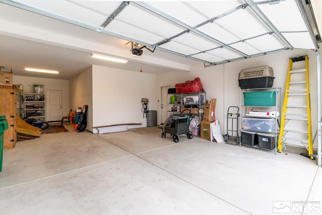 9341 Pond Court Reno, NV 89506 - Photo 27 of 30 a view of a garage with furniture and a garage