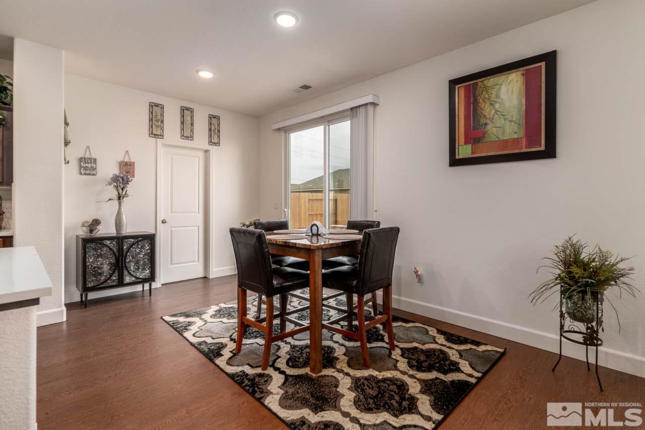 9341 Pond Court Reno, NV 89506 - Photo 7 of 30 a view of a dining room with furniture and wooden floor