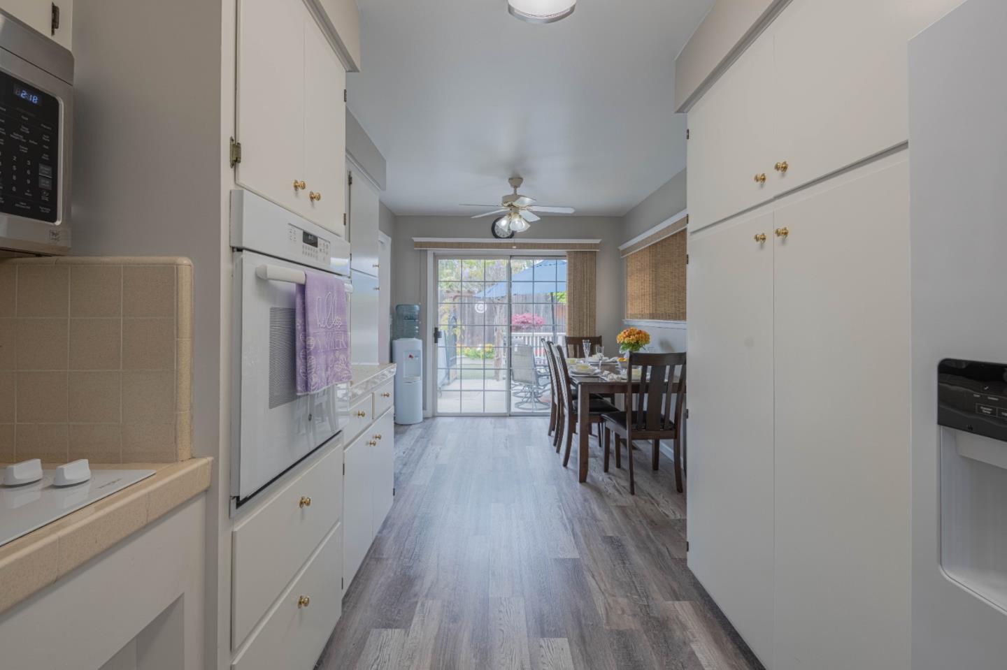 607 La Mesa Drive Salinas, CA 93901 - Photo 16 of 34 a dining room with furniture and wooden floor