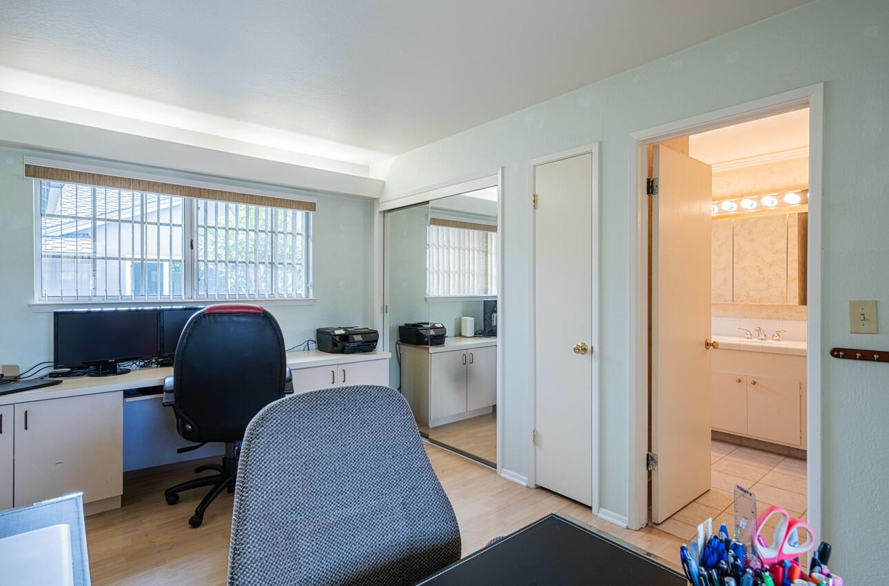 607 La Mesa Drive Salinas, CA 93901 - Photo 26 of 34 a view of a workspace with furniture and a window