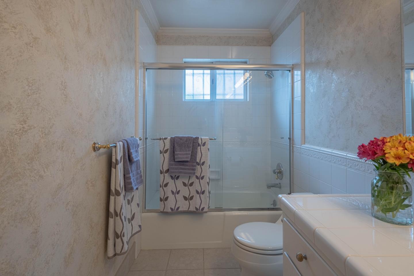 607 La Mesa Drive Salinas, CA 93901 - Photo 28 of 34 a bathroom with a sink toilet and shower