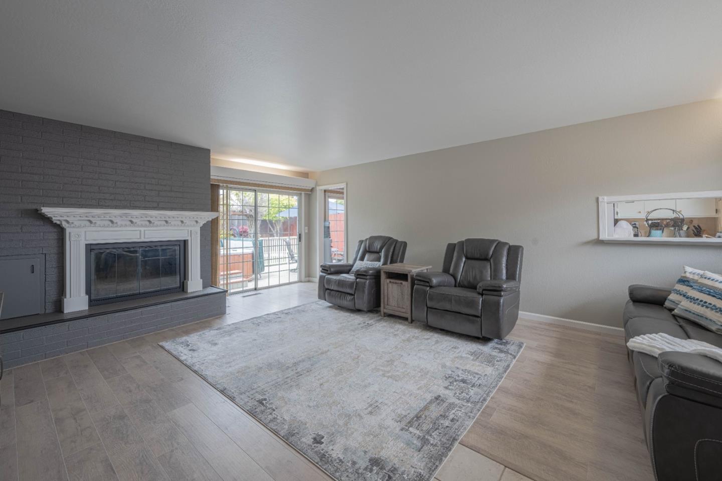 607 La Mesa Drive Salinas, CA 93901 - Photo 7 of 34 a living room with furniture and a fireplace