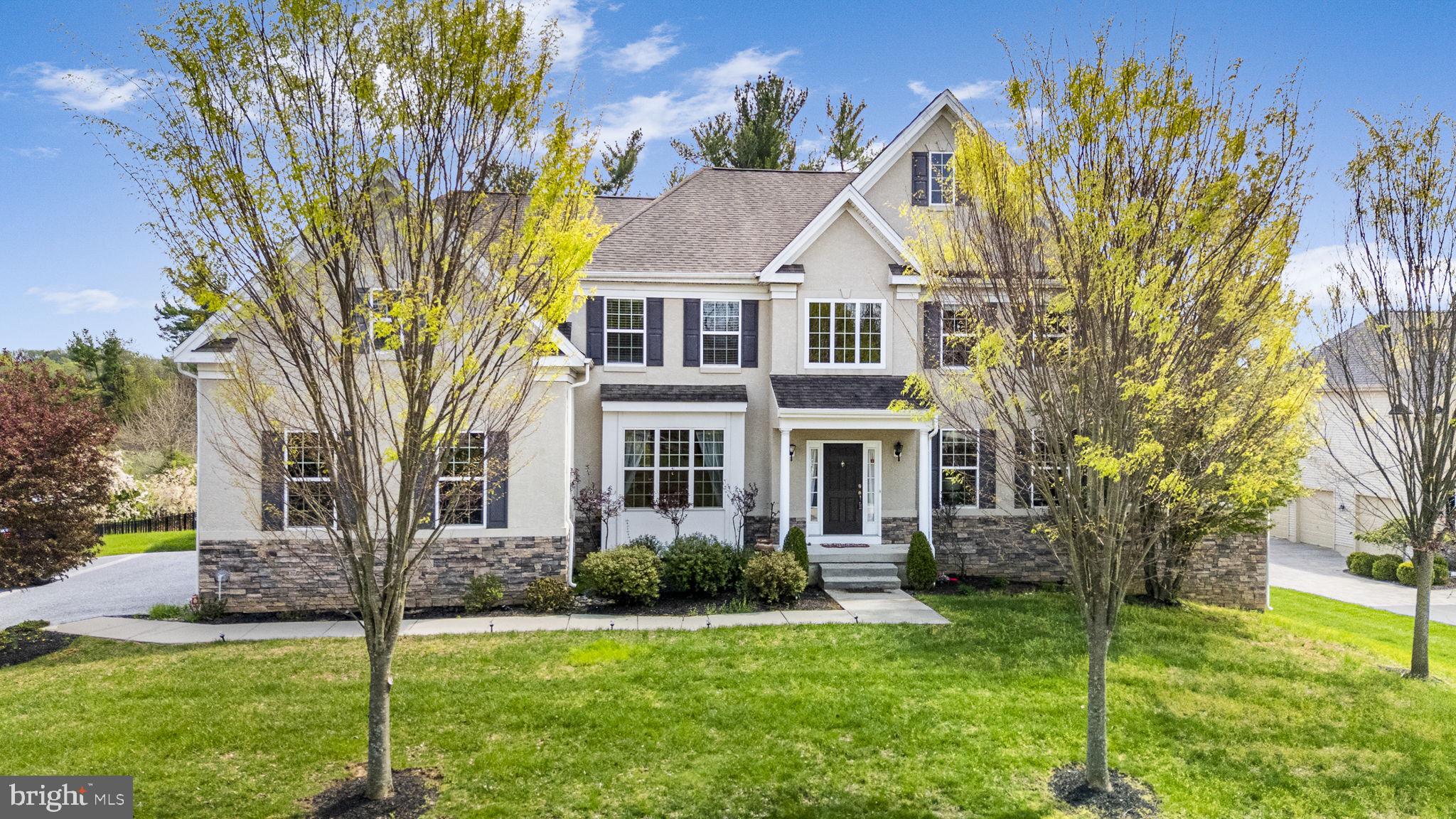 Charming home with lush greenery.