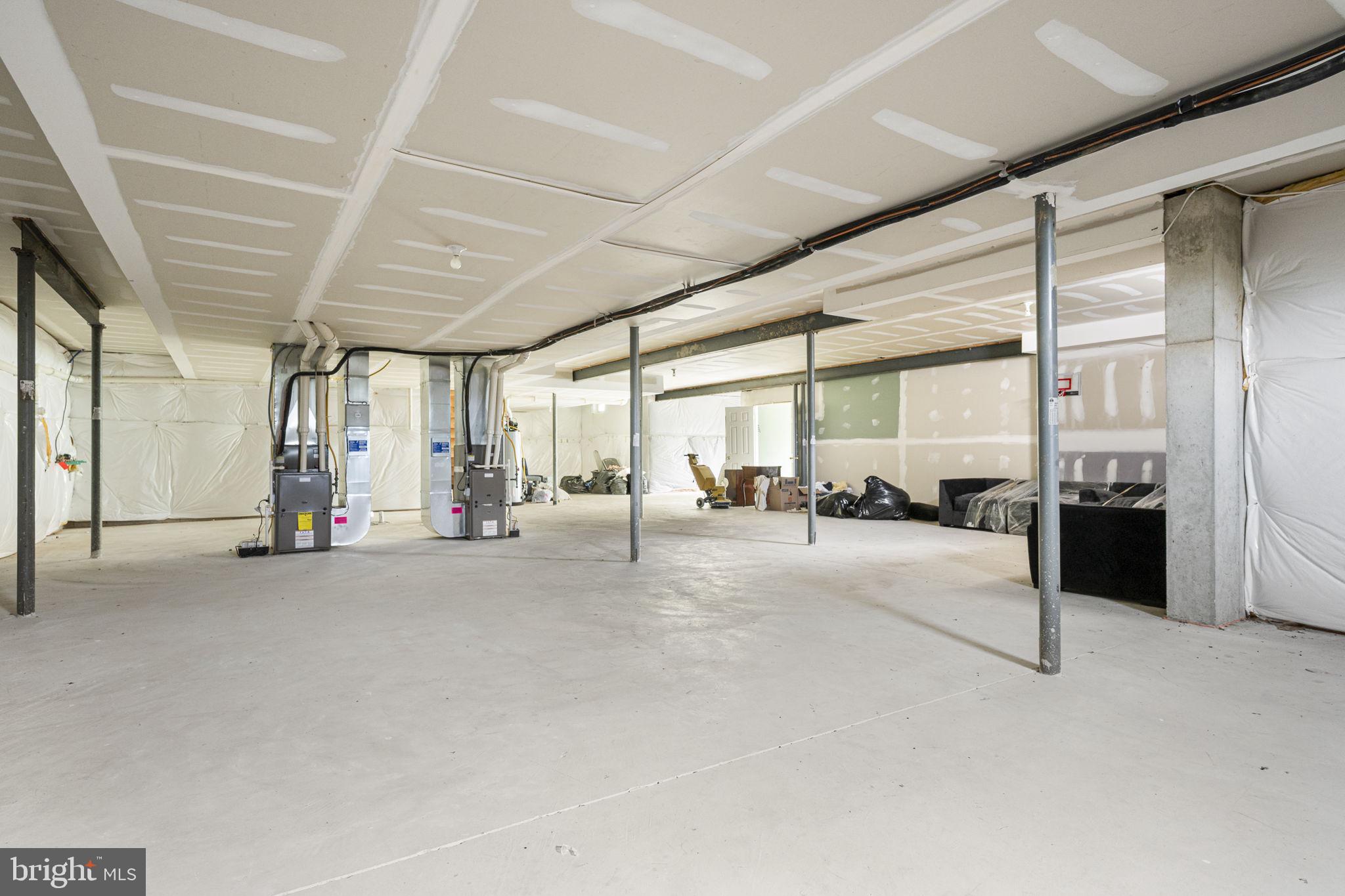 1417 Stockton Road Coatesville, PA 19320 - Photo 27 of 39 Spacious, unfinished open area awaits vision.