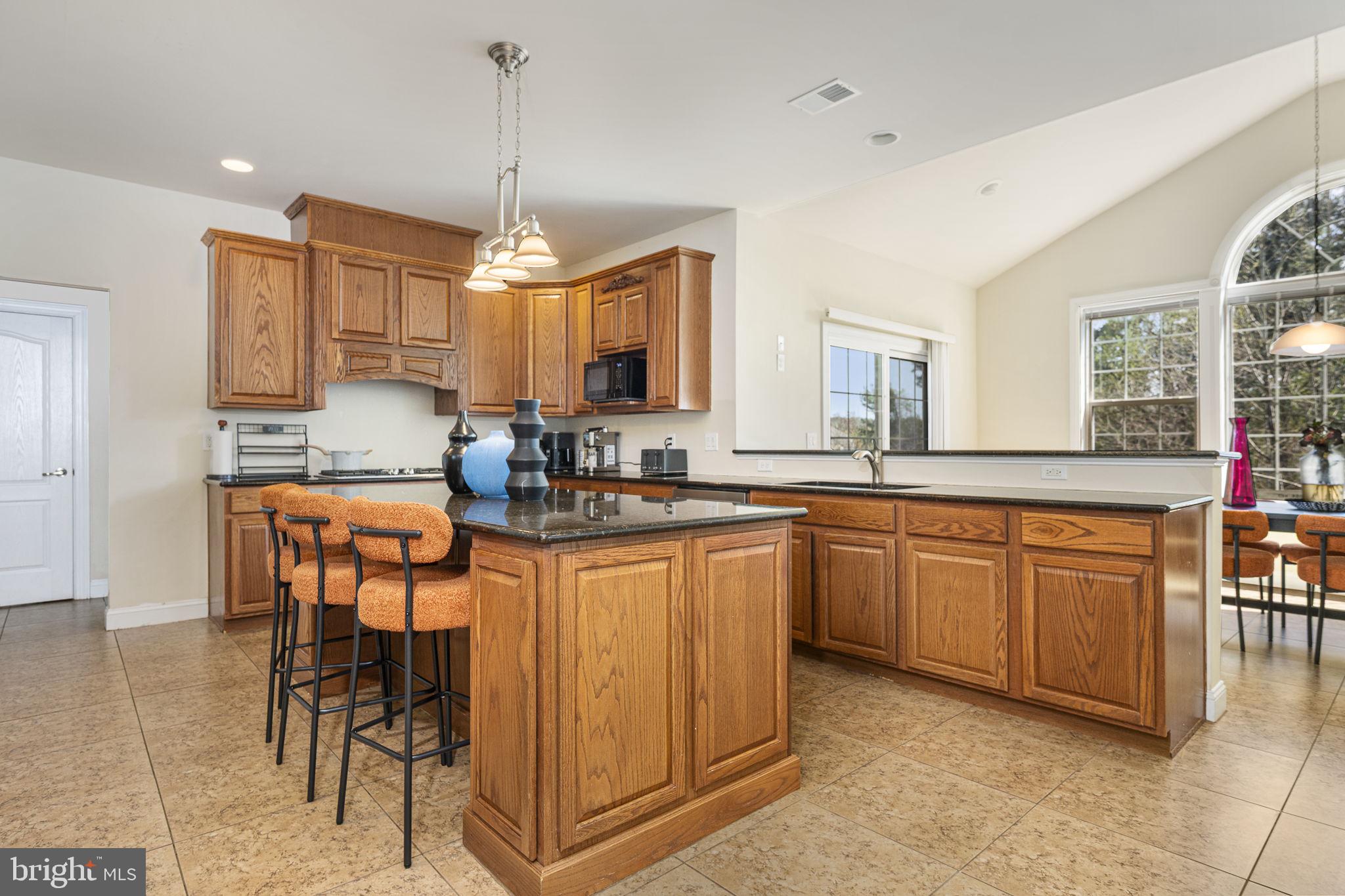 1417 Stockton Road Coatesville, PA 19320 - Photo 7 of 39 Warm wood tones in a bright kitchen.