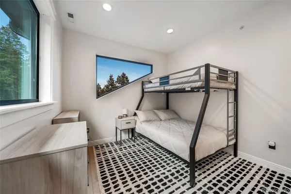 a living room with a table and window