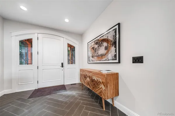 a view of a hallway with front door