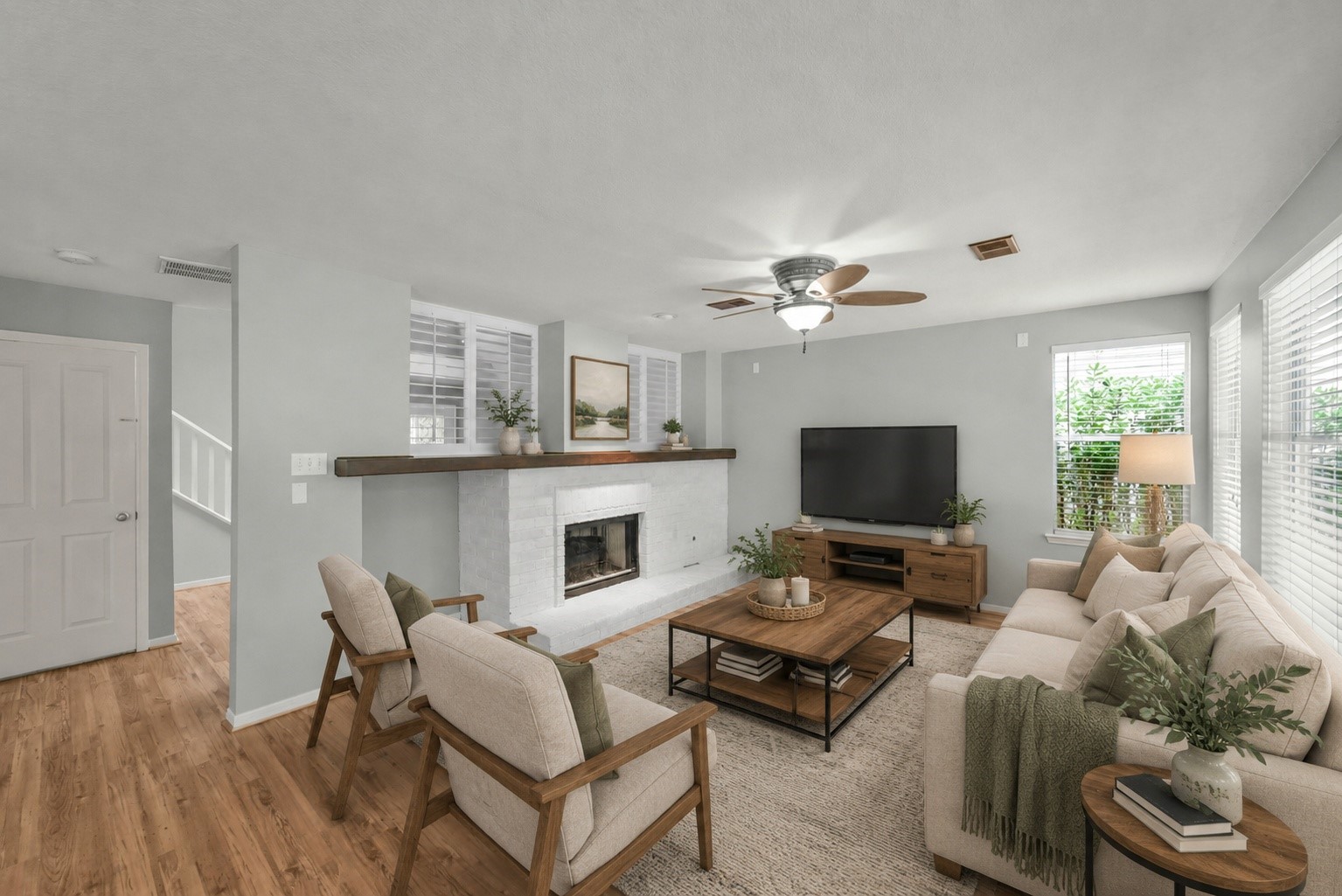 22 East New Avery Place Spring, TX 77382 - Photo 8 of 46 Rendered Livingroom downstairs with a gas fire place.