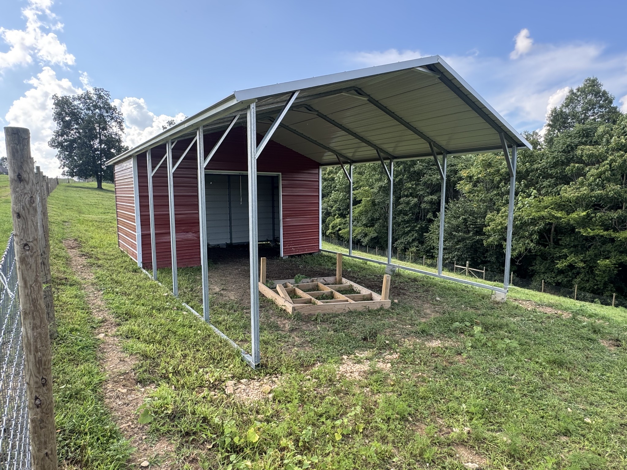 5370 Galen Road Lafayette, TN 37083 - Photo 33 of 48 a view of a house with backyard and porch