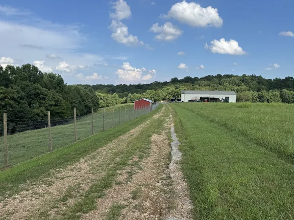 a view of a lake with a big yard