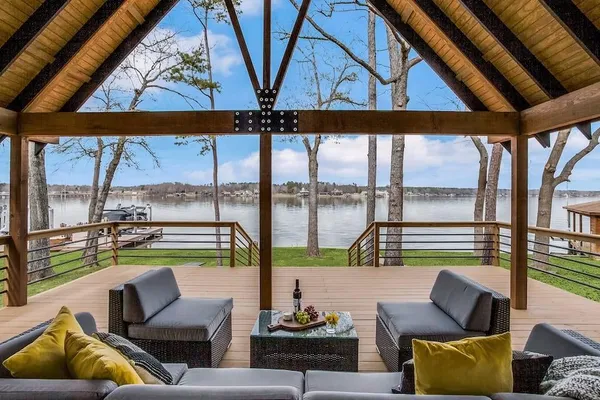view of living room with furniture and floor to ceiling windows