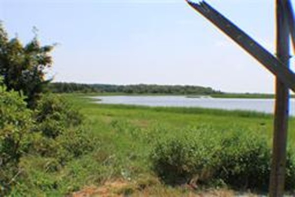 165 Great Neck Road Wareham, MA 02571 - Photo 4 of 4 a view of a lake with a big yard