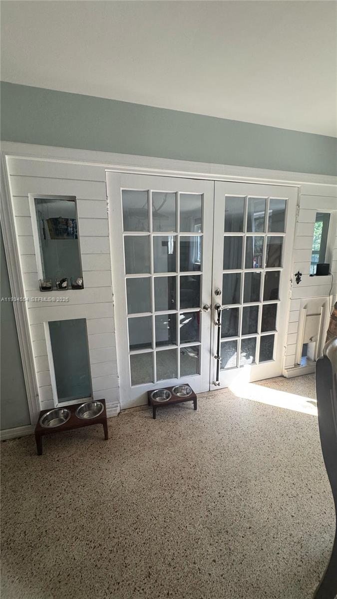 630 Northeast 165th Street Miami, FL 33162 - Photo 28 of 34 a view of a livingroom with furniture and a window