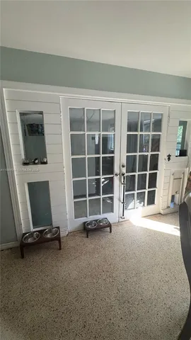 a room with wooden cabinets