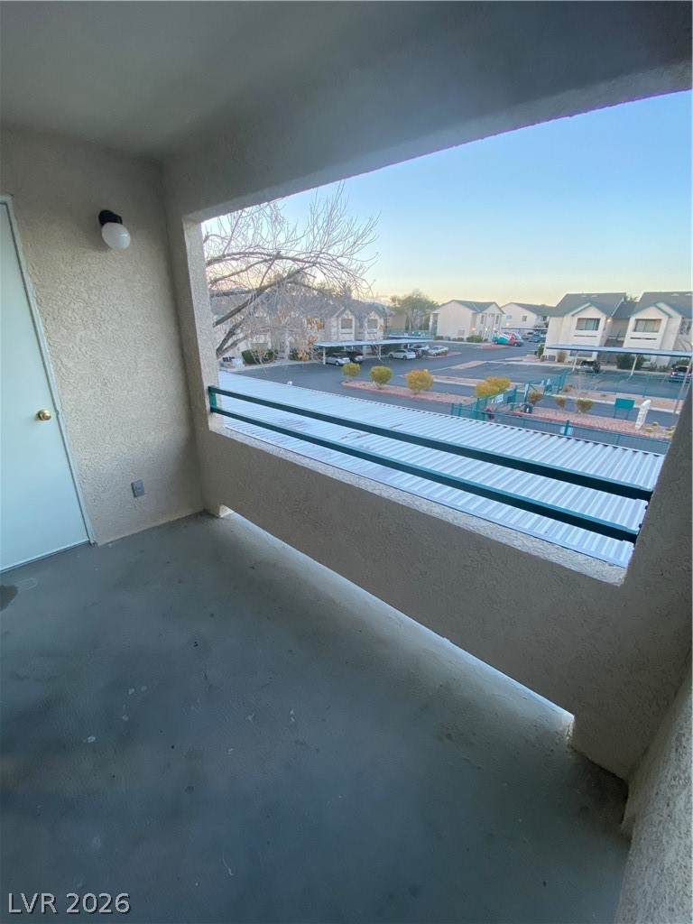 5271 South Lindell Road, Unit 202 Las Vegas, NV 89118 - Photo 8 of 27 A top-down view of a spacious porch offering neighborhood vistas.