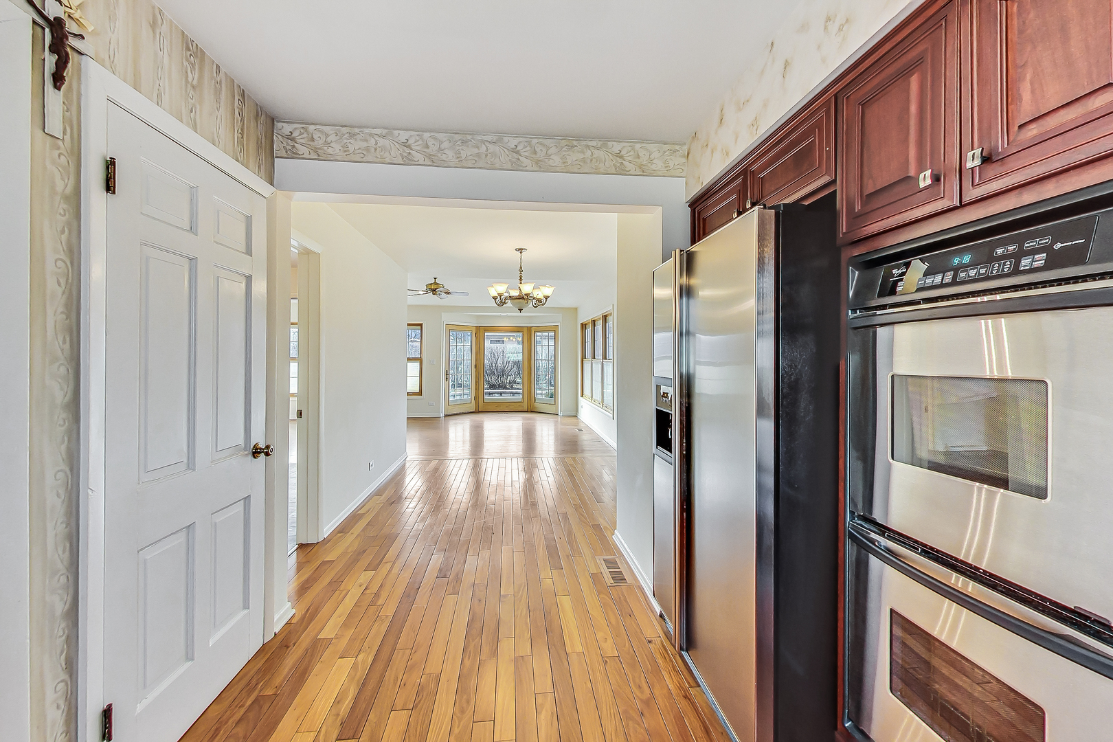 2101 Walnut Street Park Ridge, IL 60068 - Photo 12 of 37 a view of a hallway with wooden floor and staircase