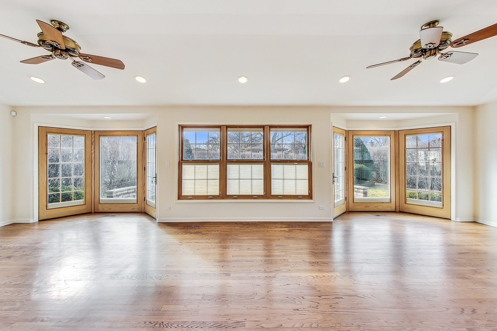2101 Walnut Street Park Ridge, IL 60068 - Photo 15 of 37 a view of an empty room with wooden floor and a window