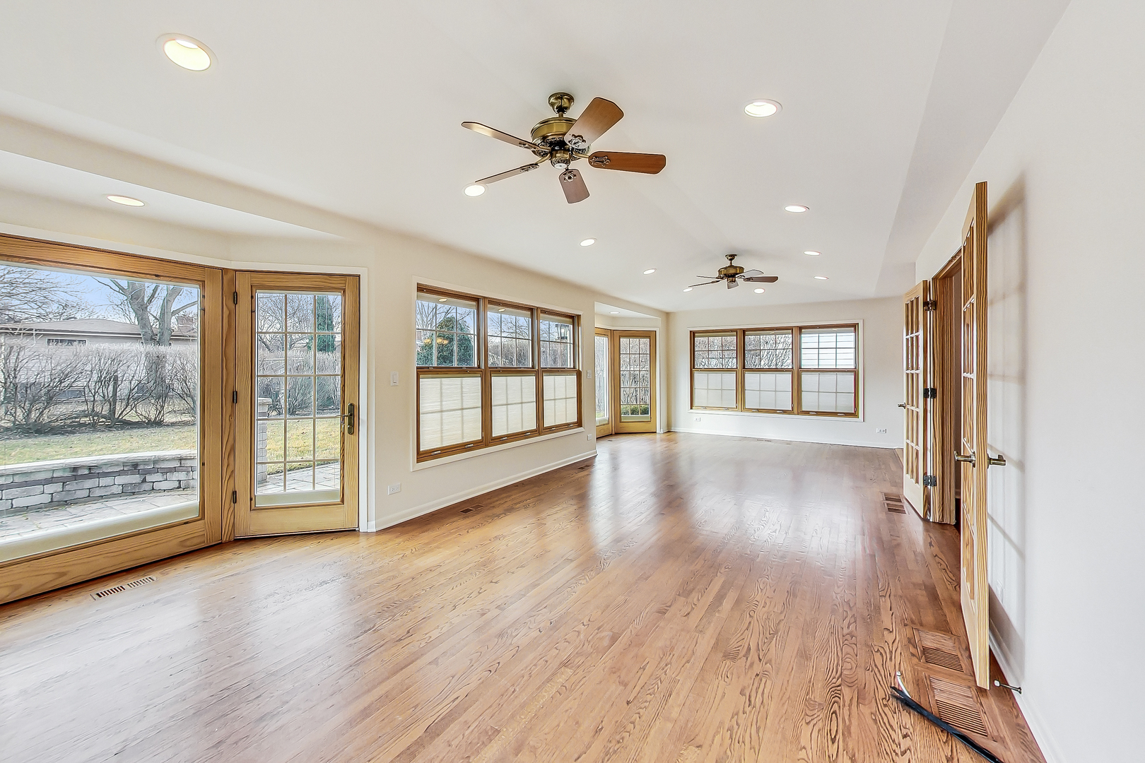 2101 Walnut Street Park Ridge, IL 60068 - Photo 16 of 37 a view of an empty room with a window and wooden floor