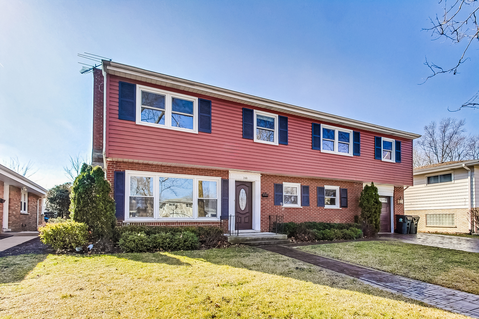 2101 Walnut Street Park Ridge, IL 60068 - Photo 2 of 37 a front view of a house with garden